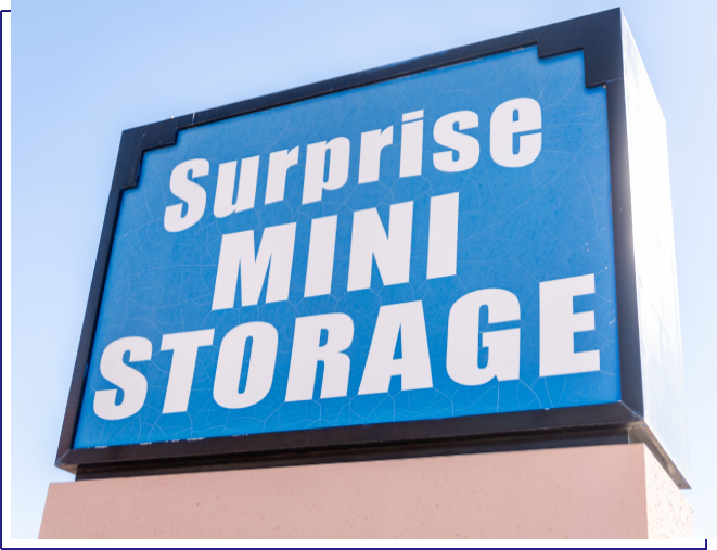 A sign that says surprise mini storage.